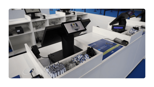Point of sale counter and payment terminal at a major sporting event, an example of in-store POS systems built to keep trading under pressure